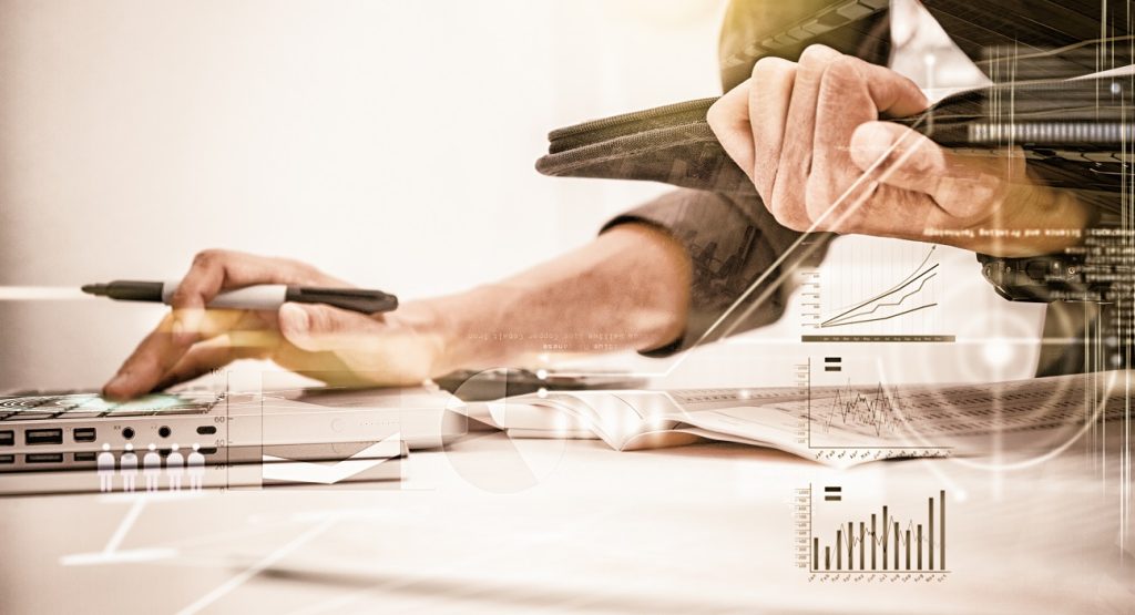 Business Woman Preparing Documents And Graph