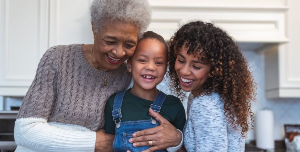 Elderly woman with daughter and granddaughter