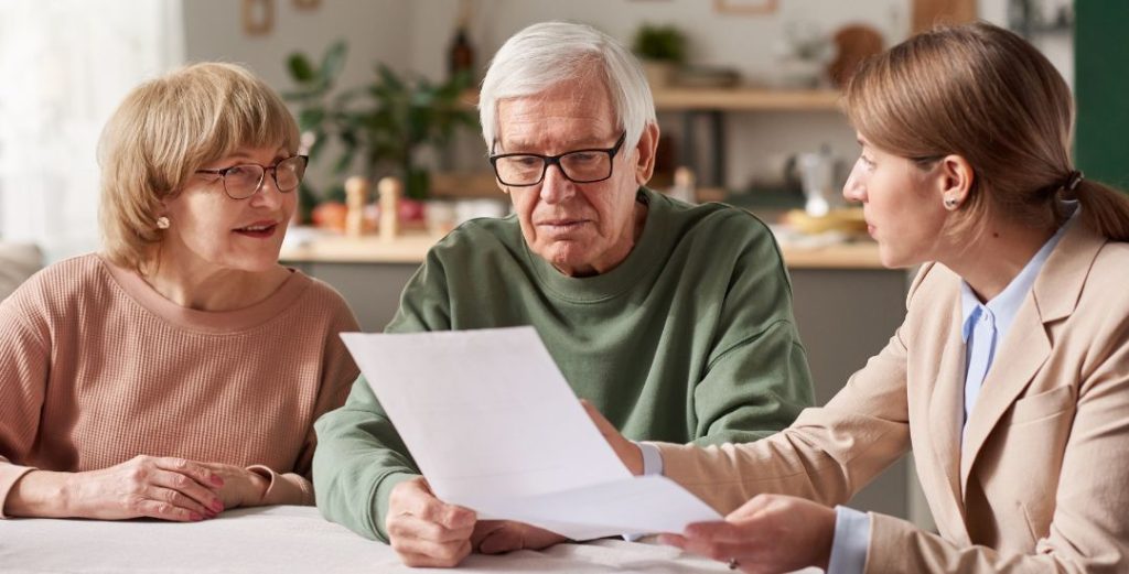 Senior couple meeting with advisor